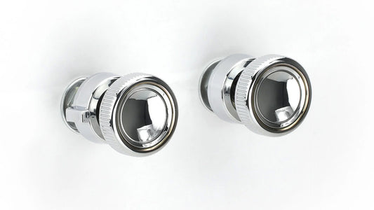 Chrome radio knob set with ridged edges, close-up detail shot