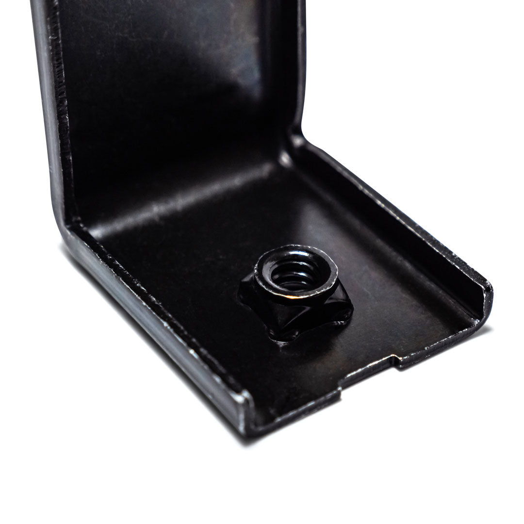 Bronze metal window track stopper with mounting holes, side view