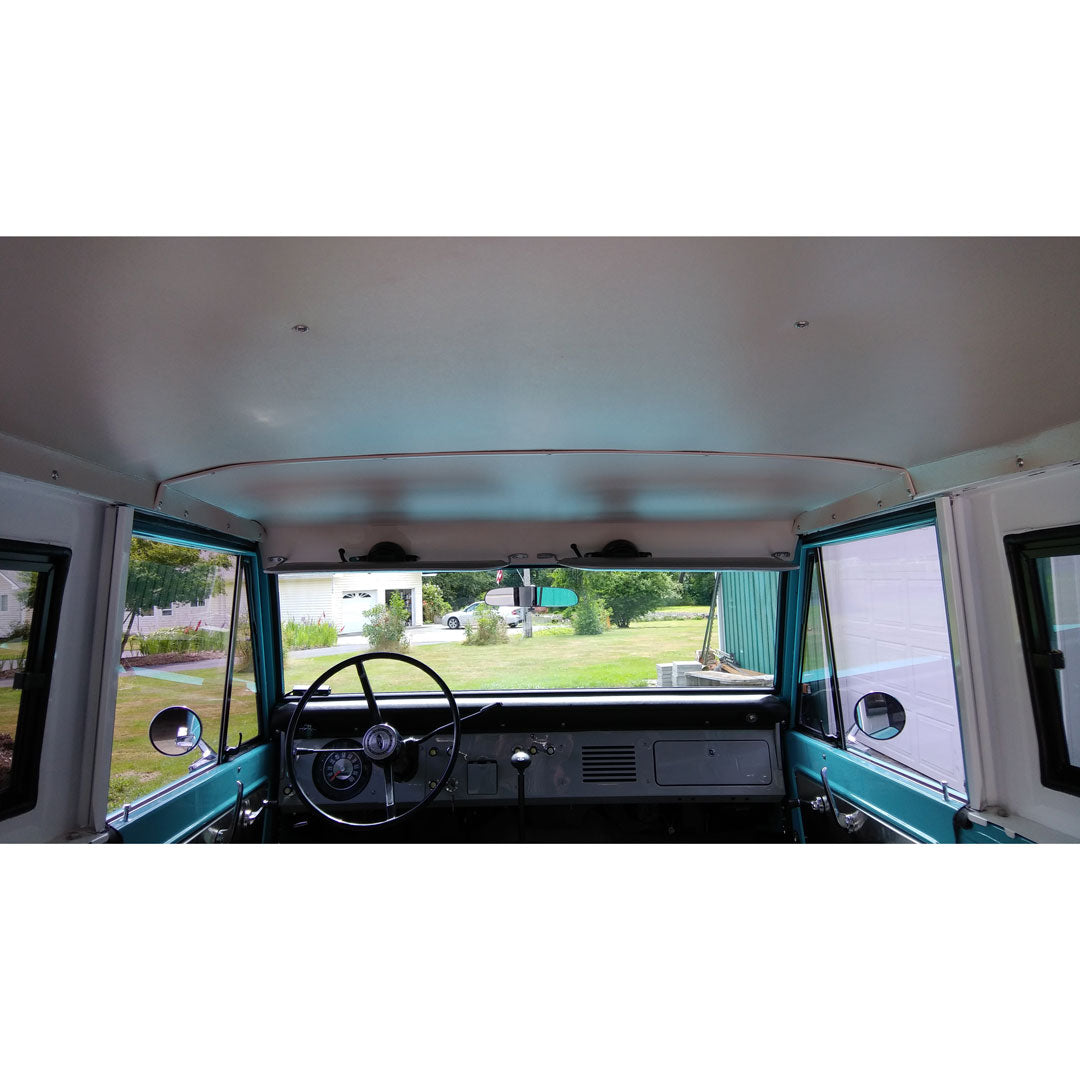 Parchment white headliner for vacuum wipers with textured surface, front view
