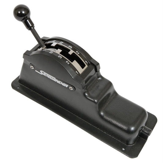 Black metal floor shifter with chrome knob and linkage, side view
